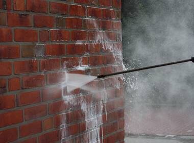 Powerwashing to remove graffiti on monuments and memorials